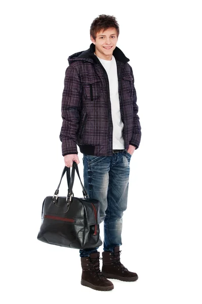 Молодой человек в мешке для пальто — стоковое фото