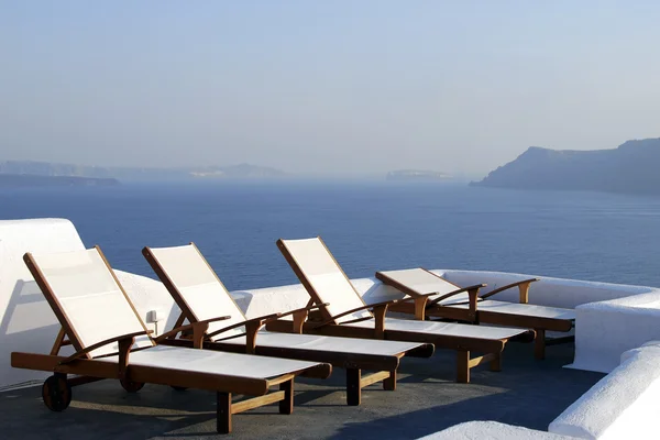 Stock image White beach loungers