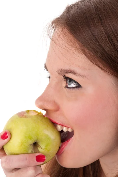 The girl eats a green apple — Stock Photo, Image