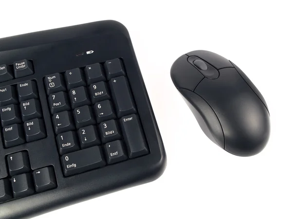 Bir bilgisayarın klavye bir beyaz arka plan ile bir fare