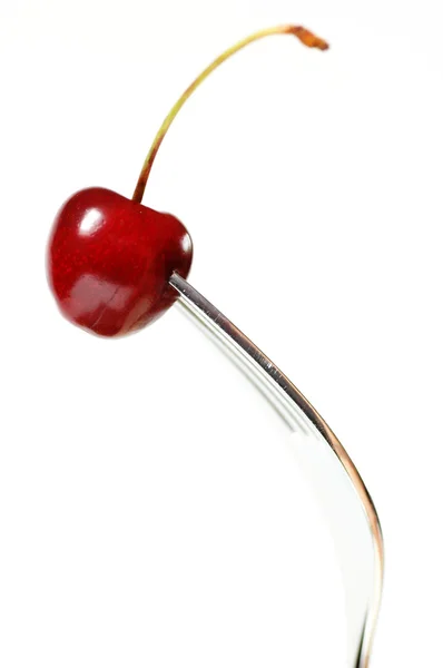 Cereza roja en tenedor —  Fotos de Stock
