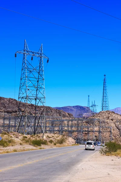 Power Transmission Towers by Highway — Stock Photo, Image