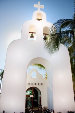 Church bell tower in Playa del Carmen clipart