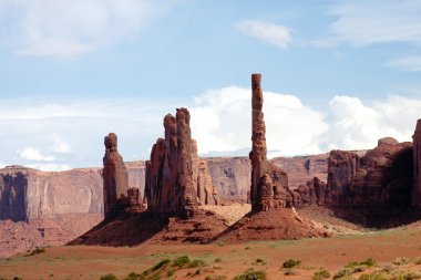 Totem Poles at Monument Valley clipart