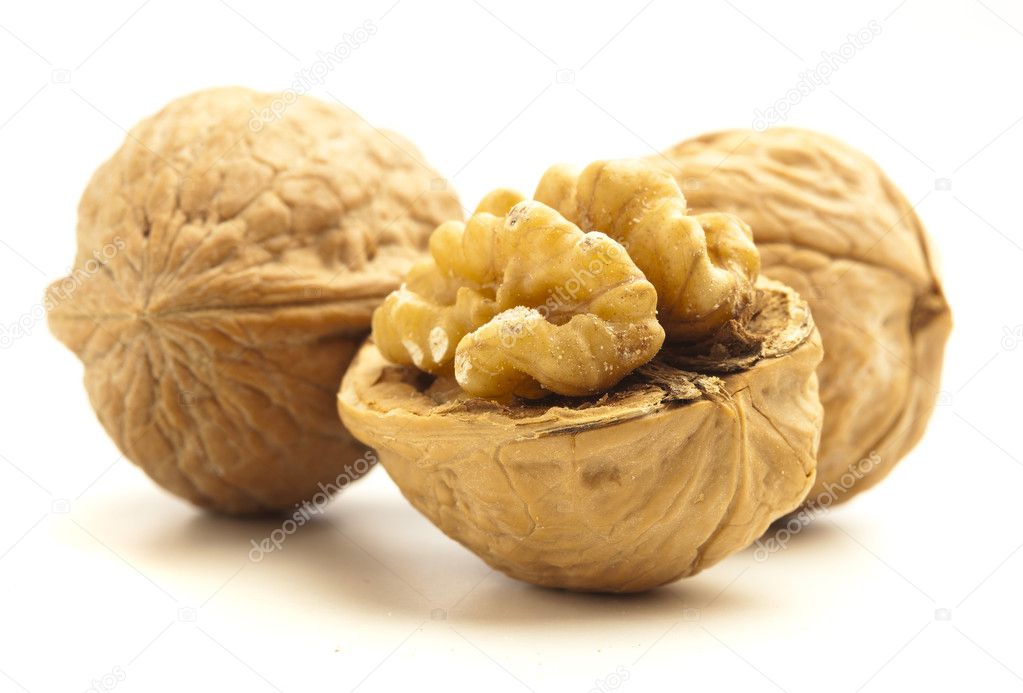 peeled wallnuts isolated on a white background