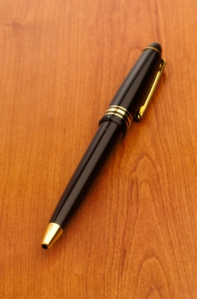 Ручка на поверхности — стоковое фото
