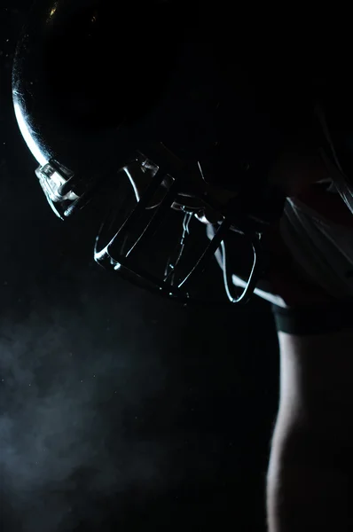 Backlit portrait of american football player — Stock Photo, Image