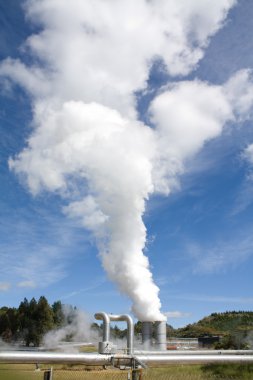 Geothermal power plant pipes and mist clipart