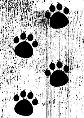 paw prints on grunge background clipart