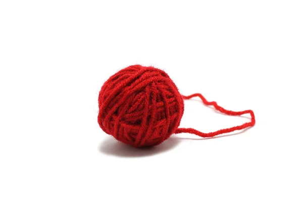 stock image Red yarn ball over white