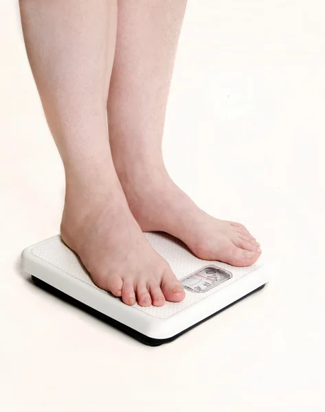 Váha měřítko a nohy — Stock fotografie