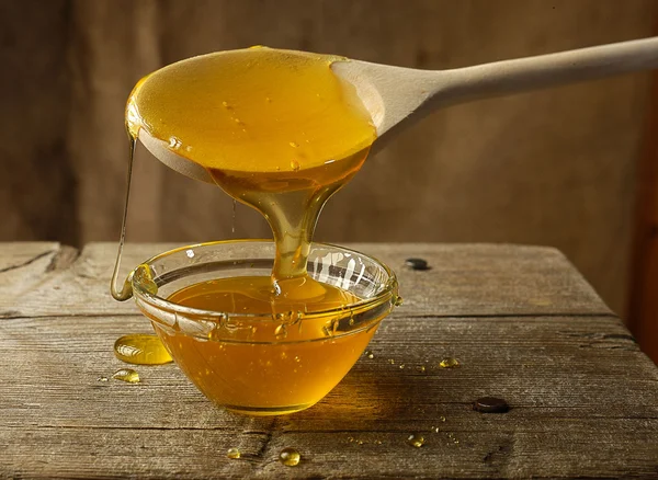 Ложку меду — стокове фото