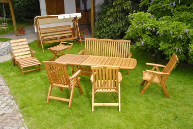 The Garden furniture by the garden house clipart