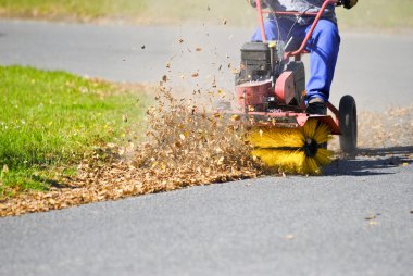 Clean the street of the leaves clipart