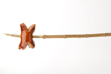 Grilled sausage on a stick clipart