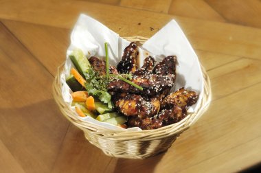 Grilled chicken wings with vegetable clipart