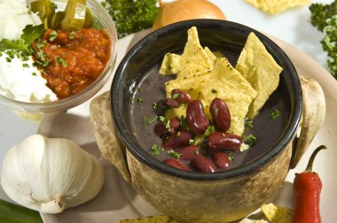 Soup con carne mexican style w tortilla chips and salsa clipart