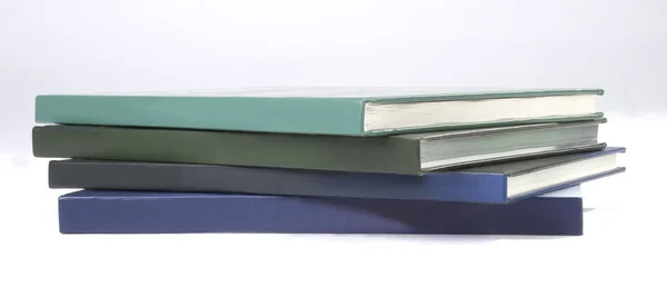 Cubierta de cuatro libros en blanco —  Fotos de Stock