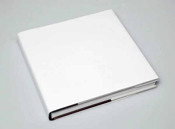 Ένα Κενό Βιβλίο Στη Γωνία Λευκό Χαρτί — Φωτογραφία Αρχείου