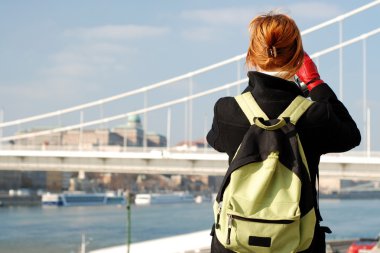 Tourist taking picture clipart