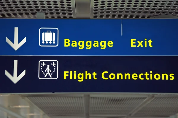 Airport direction flight connection, baggage and exit sign — Stock Photo, Image