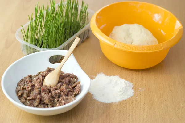 Dough with forcemeat end Wheat sprouts — Stock Photo, Image