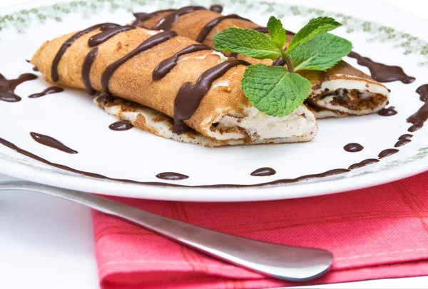 Pancakes with chocolate sauce — Stock Photo, Image