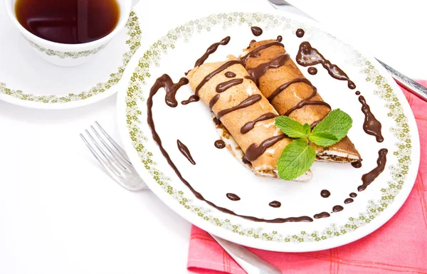 Pancakes with chocolate sauce — Stock Photo, Image