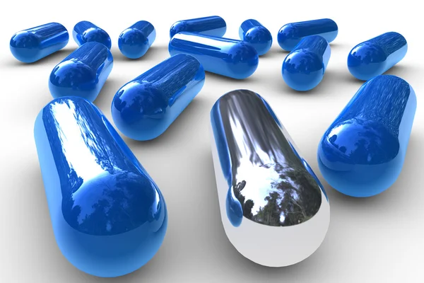 Chrome capsule with blue capsule — Stock Photo, Image
