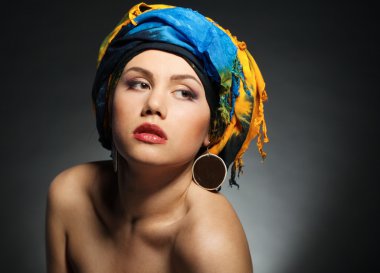 A young woman dressed in a turban clipart