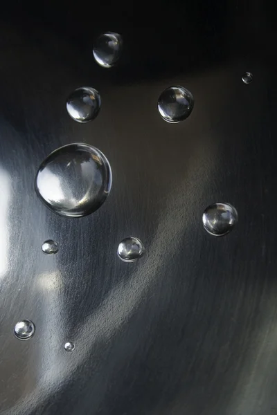 stock image Water drops on metallic surface