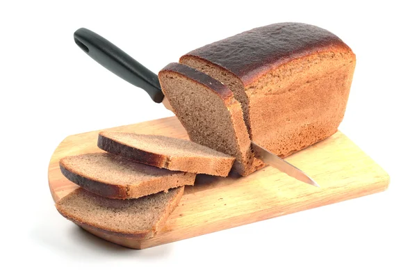 Rye bread on hardboard isolated on white background — Stock Photo, Image
