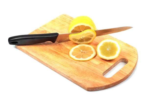 stock image Lemon and knife on hardboard