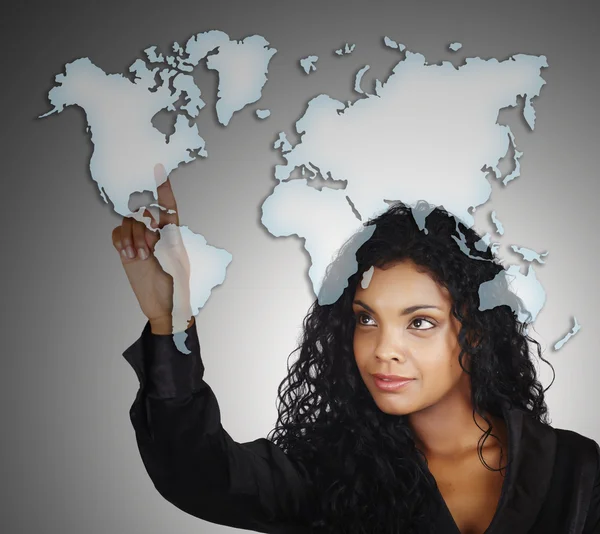 Beautiful African American businesswoman pointing at the North America Stock Picture