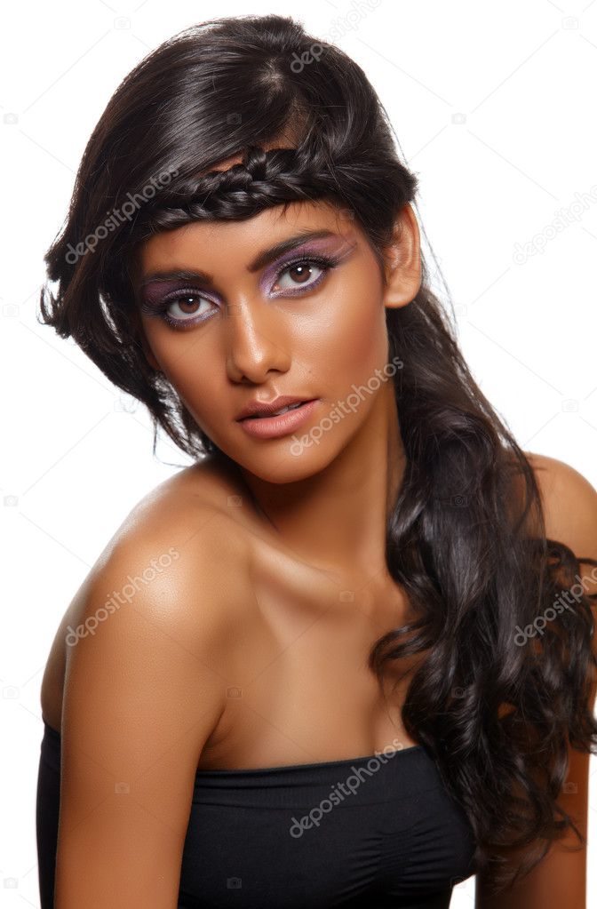 Tanned woman with curly hair