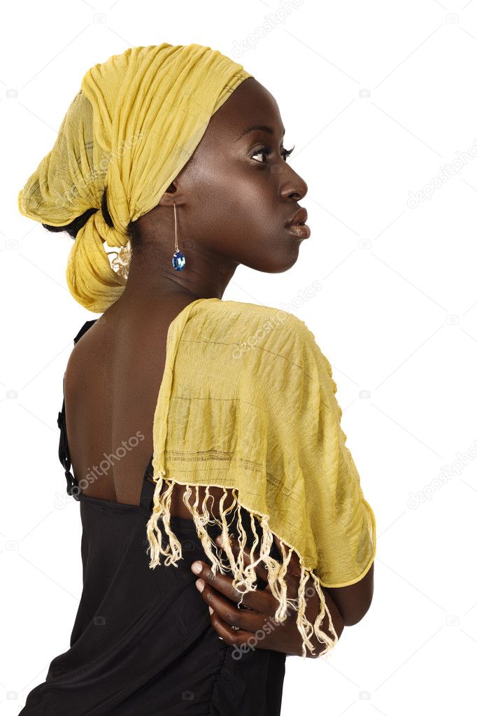 Serious South African woman with yellow scarf.