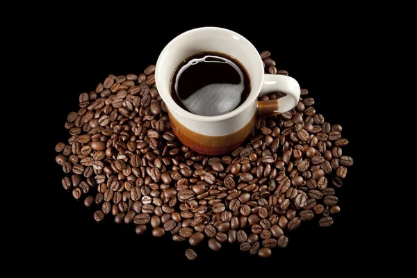 Чашка кофе и бобы — стоковое фото