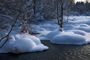 Winter landscape with a river clipart