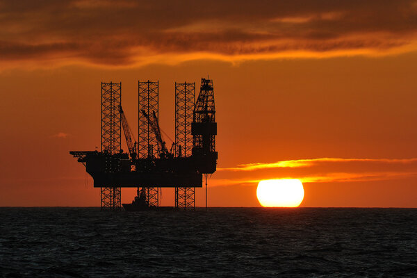 Jackup rig at sunset