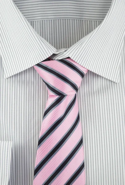 New shirt with striped silk necktie — Stock Photo, Image