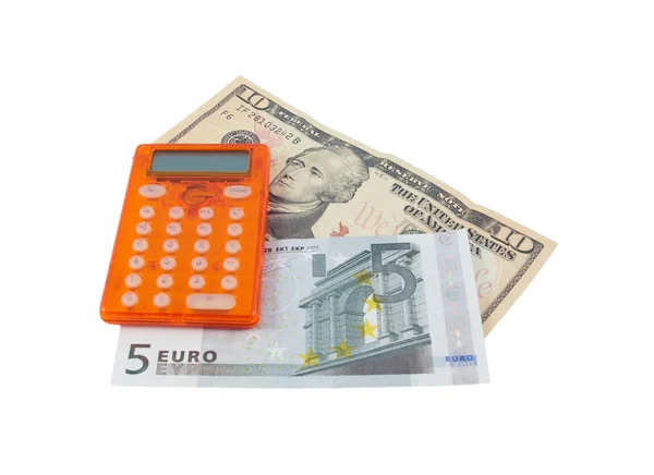 Calculator with 5 euro and 10 dollar banknotes — Stock Photo, Image
