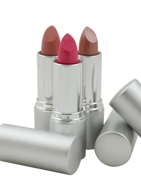 Close-up van drie veelkleurige lippenstiften — Stockfoto