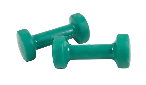 Green dumbbells isolated on a white — Stock Photo, Image