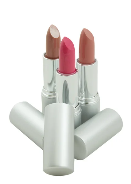 Three lipsticks on a white — Stock Photo, Image