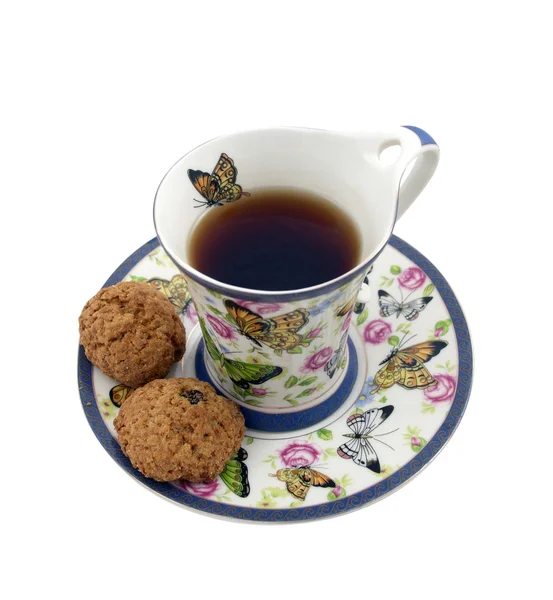 Šálek čaje a ovesné vločky cookies — Stock fotografie