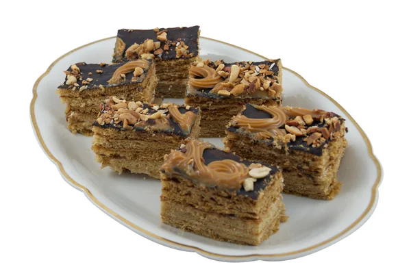 Kousky medového koláče na talíři — Stock fotografie