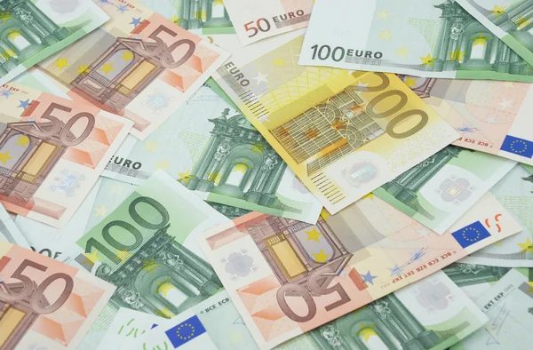 50, 100 and 200 euro banknotes background — Stock Photo, Image