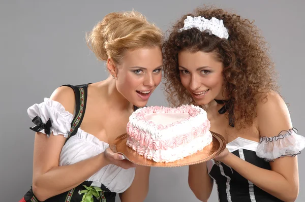 Twee mooie meisjes serveerster — Stockfoto