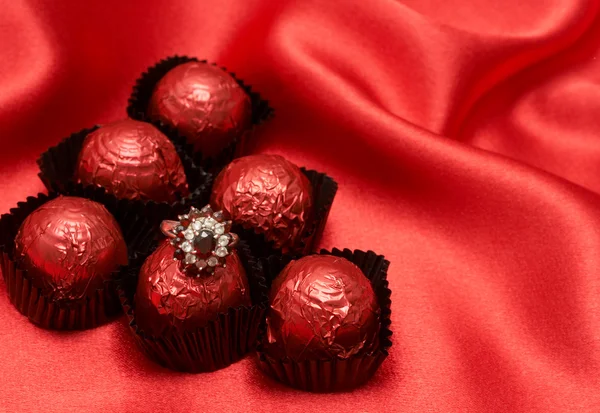 Valentines chocolate candy with a ring — Stock Photo, Image