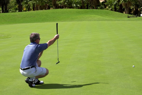 Golfer op de groene — Stockfoto